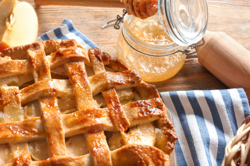 Tasty homemade apple pie on table