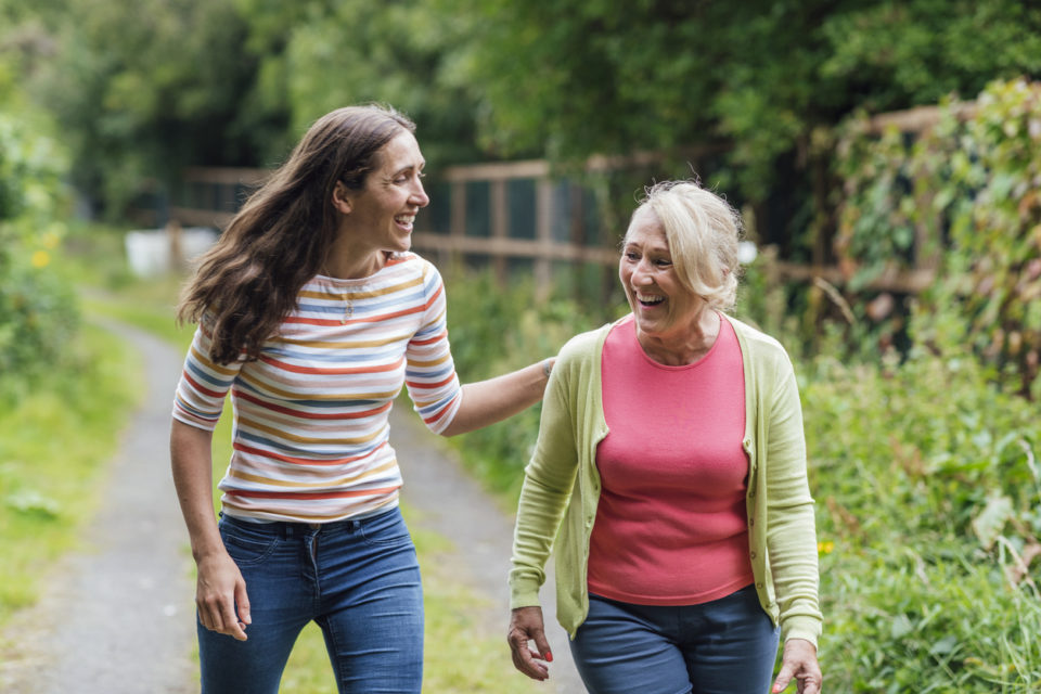 Mother and Daughter Walking Together