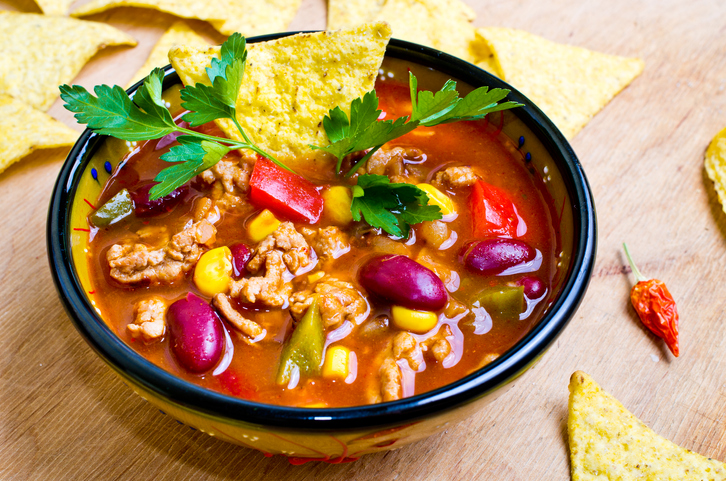 Mexican soup (like chili con carne) with tacos